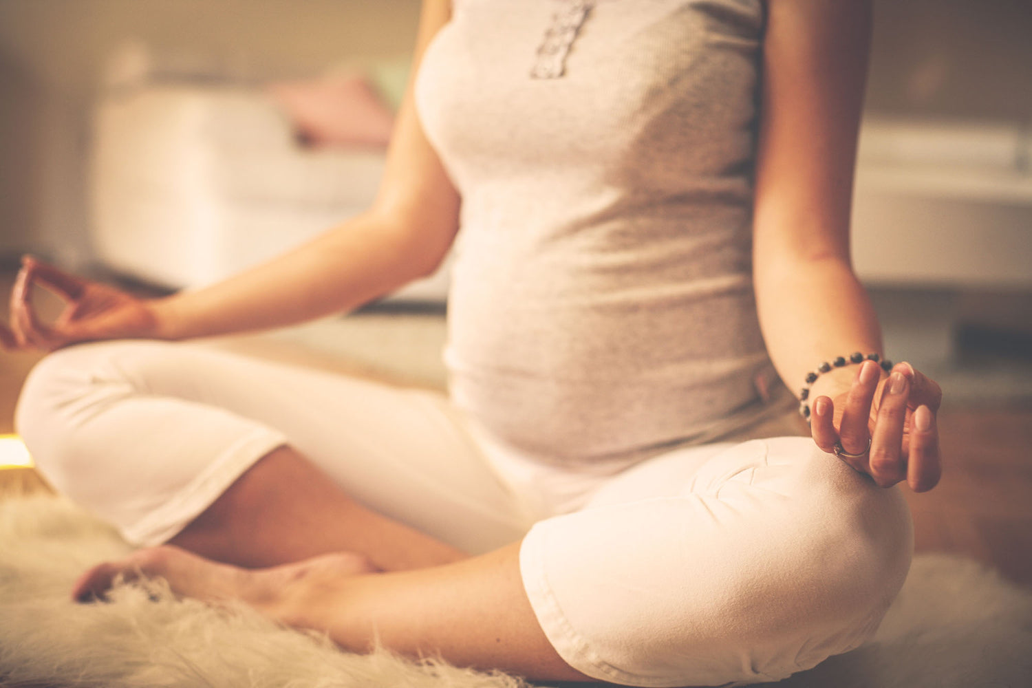 A pregnant woman doing a yoga pose