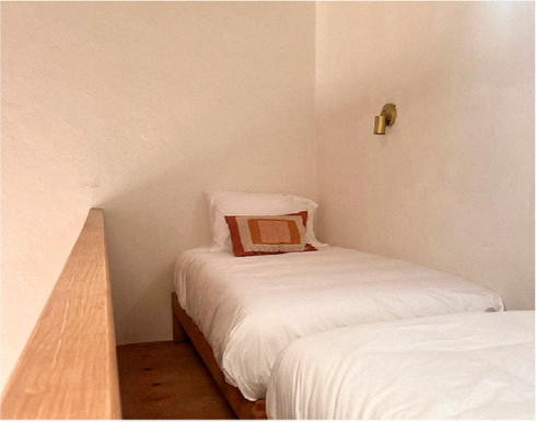 Upper Level Mezzanine -(two twin beds shared with lower level king)